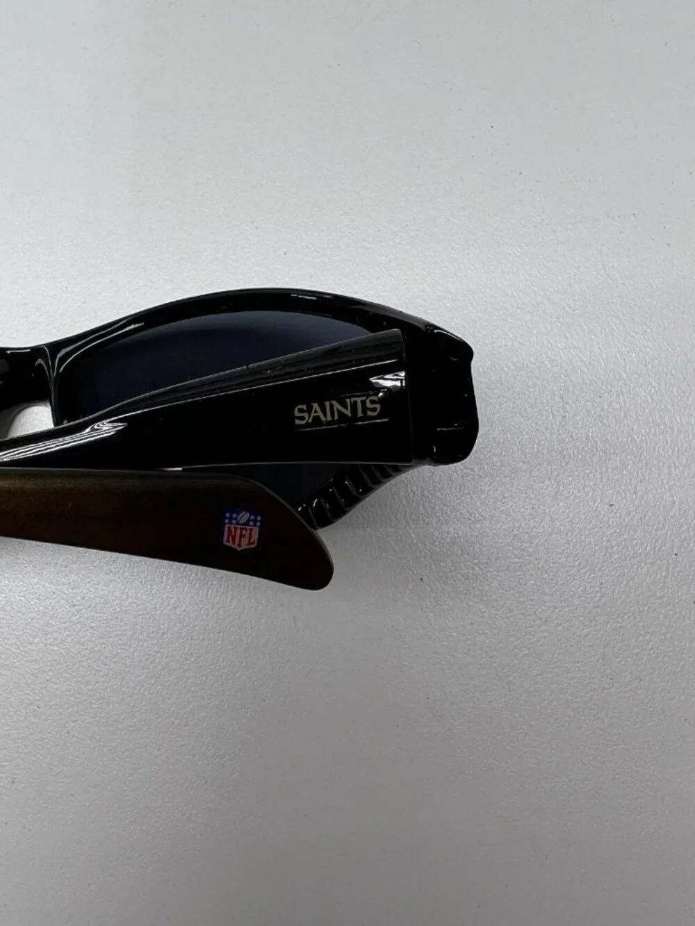 New Orleans Saints Sunglasses Youth Quake with Pouch Bag NFL Official Merch